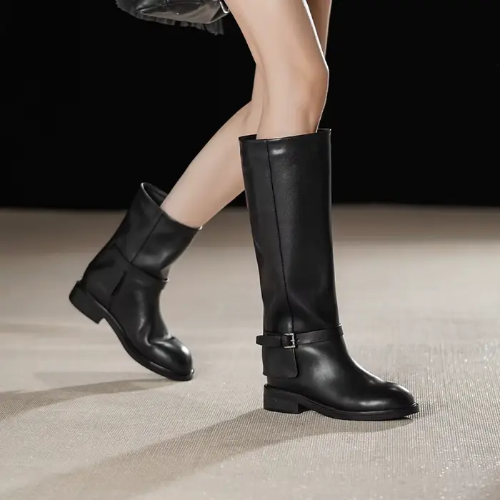Bottes d'équitation de rue noires de styliste