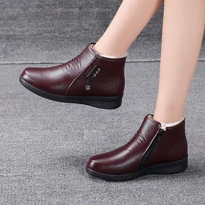 Bottes de neige en cuir à semelle souple pour femme
