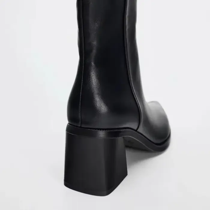 Bottines Chelsea en cuir souple noir à bout pointu et talon épais pour femme