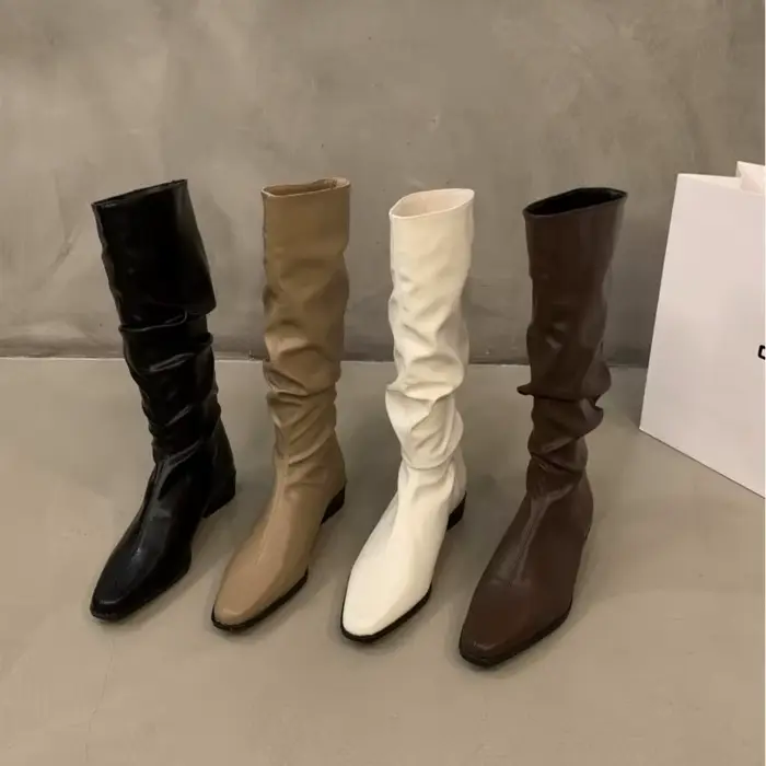 Bottes rétro pointues à talons épais et longs pour femmes