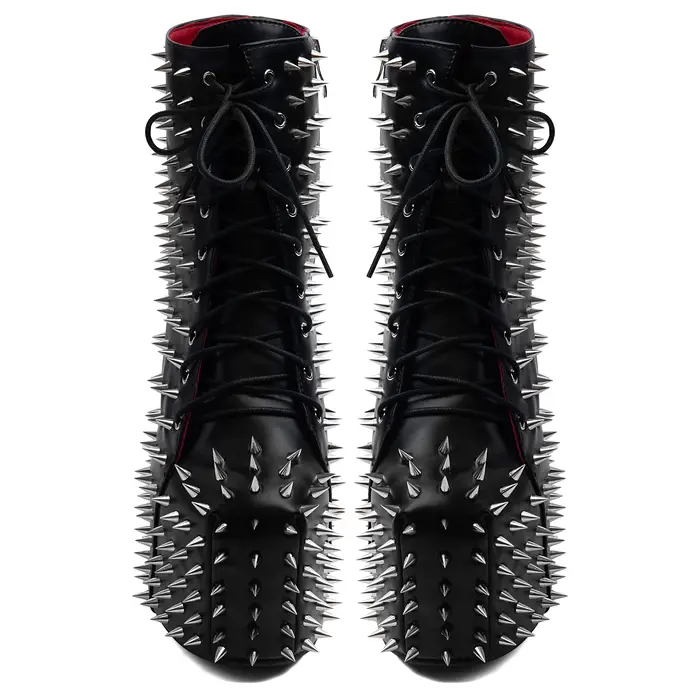 Bottines noires en cuir à rivets