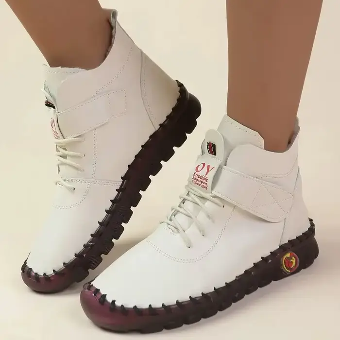Bottes courtes en cuir et fourrure épaisse pour femme